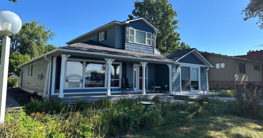 Forest Lake, MN exterior remodeling project featuring LP SmartSide siding, GAF Timberline HDZ roofing, and new gutters.