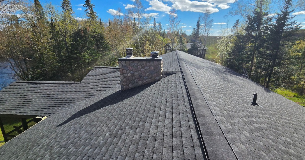 Clam Lake, WI home after GAF Timberline UHDZ roof replacement and attic insulation improvements by Precise Exteriors.