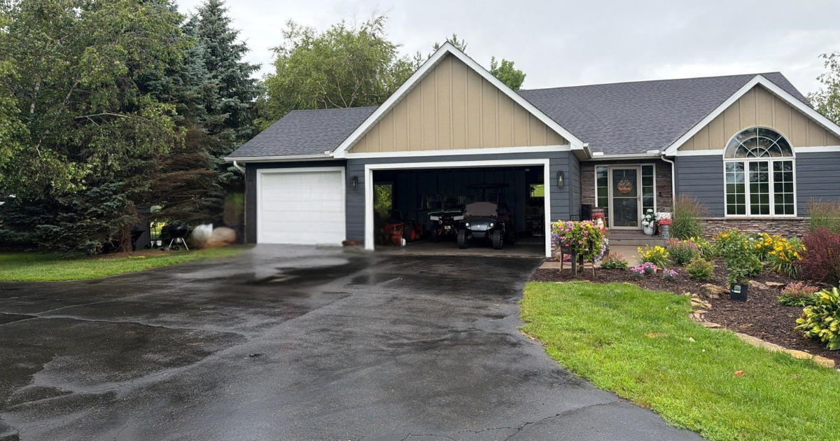 LP SmartSide siding replacement in Prescott, WI featuring new siding, trim, and board-and-batten accents.